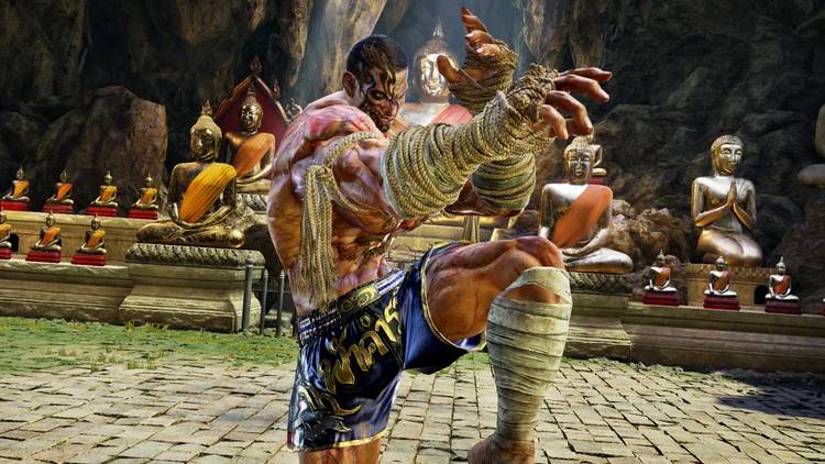 Fahkumram fighting in Tekken 7's Cave of Enlightenment stage