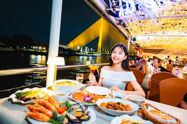 Dinner laid out on the deck of a river cruise