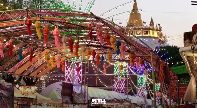 Lanterns and fair stalls below the Golden Mount