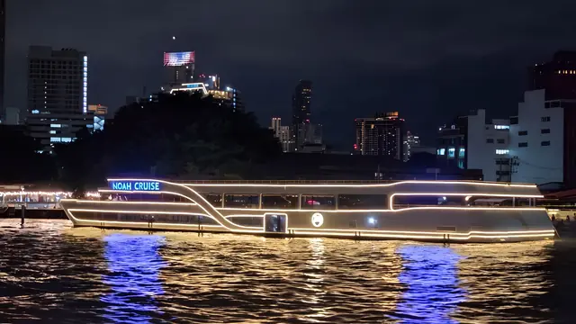 Noah Cruise on the river at night