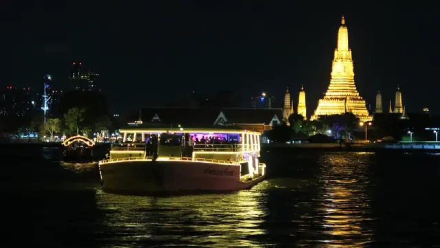 Chao Phraya Princess passing Wat Arun at night