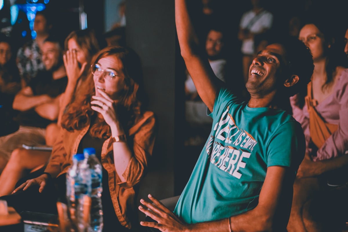 A cheering audience at The Comedy Joint