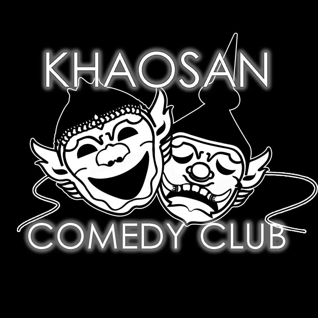 Khaosan Comedy Club logo: two Thai masks, one laughing and one crying, in white on black