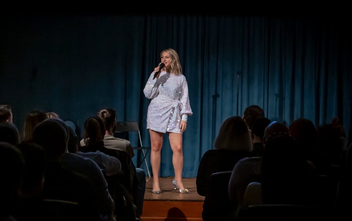 Elena Gabrielle performing in front of an audience