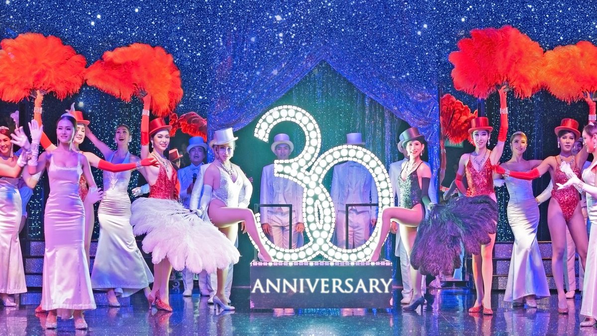 Calypso Cabaret performers on stage at the show’s 30th anniversary