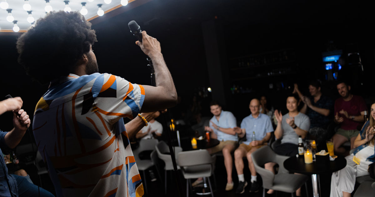 On stage at an open mic